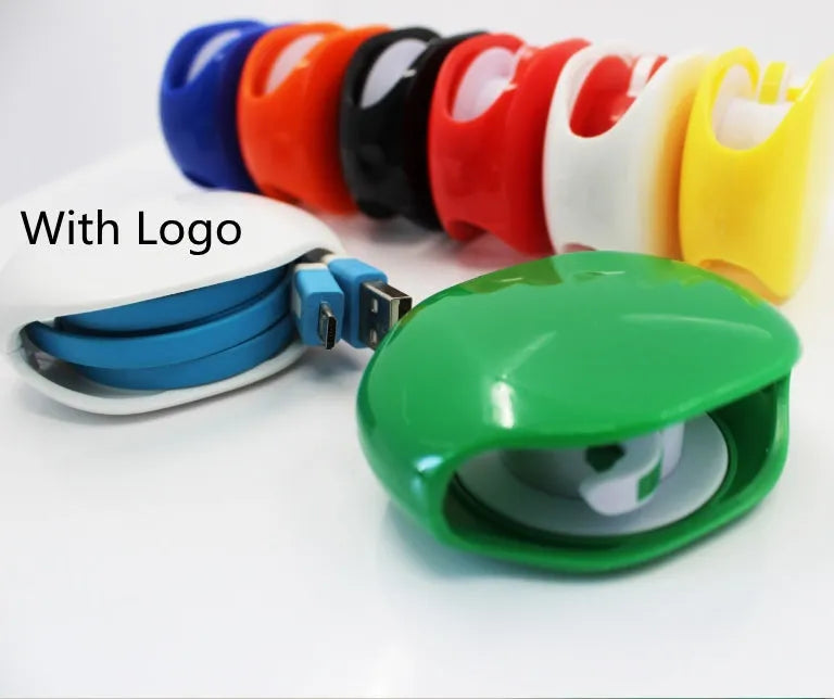 Automatic earphone retractor winder in black with extended cable showing push-type mechanism