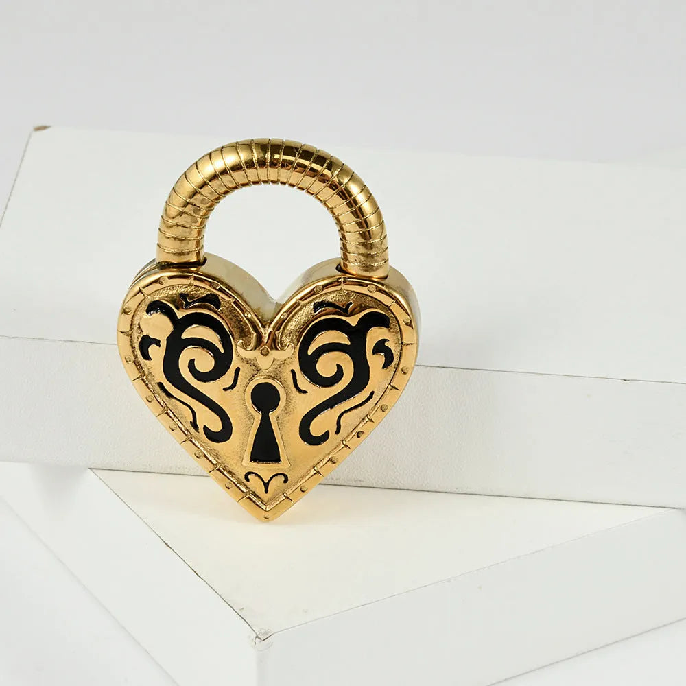 Women's stainless steel heart-shaped ear piercing studs in gold or steel colour options
