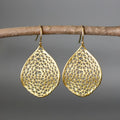 Gold retro drop-shaped pendant earrings with hollow leaf design on alloy metal