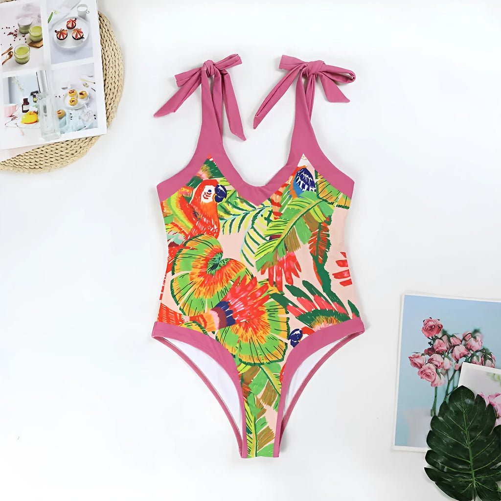 Pink floral print retro one-piece swimsuit with V-neck and thin skirt for women.