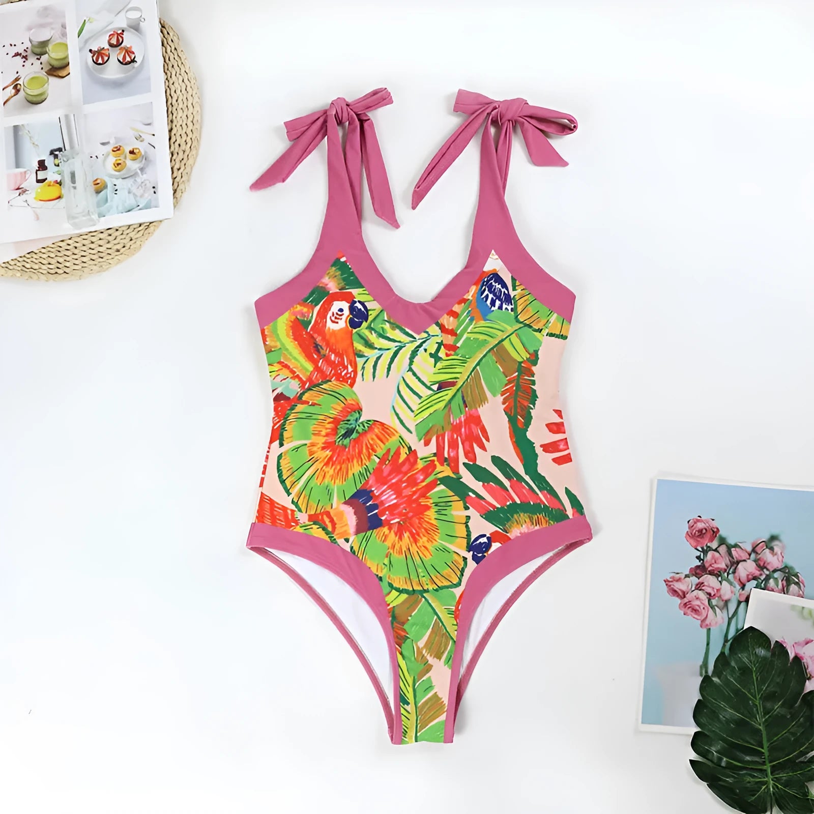 Pink floral print retro one-piece swimsuit with V-neck and thin skirt for women.