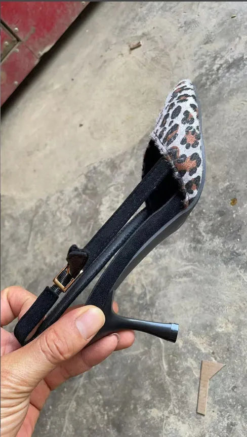 Women's leopard print suede sandals with scattered pointed toe design shown from side view