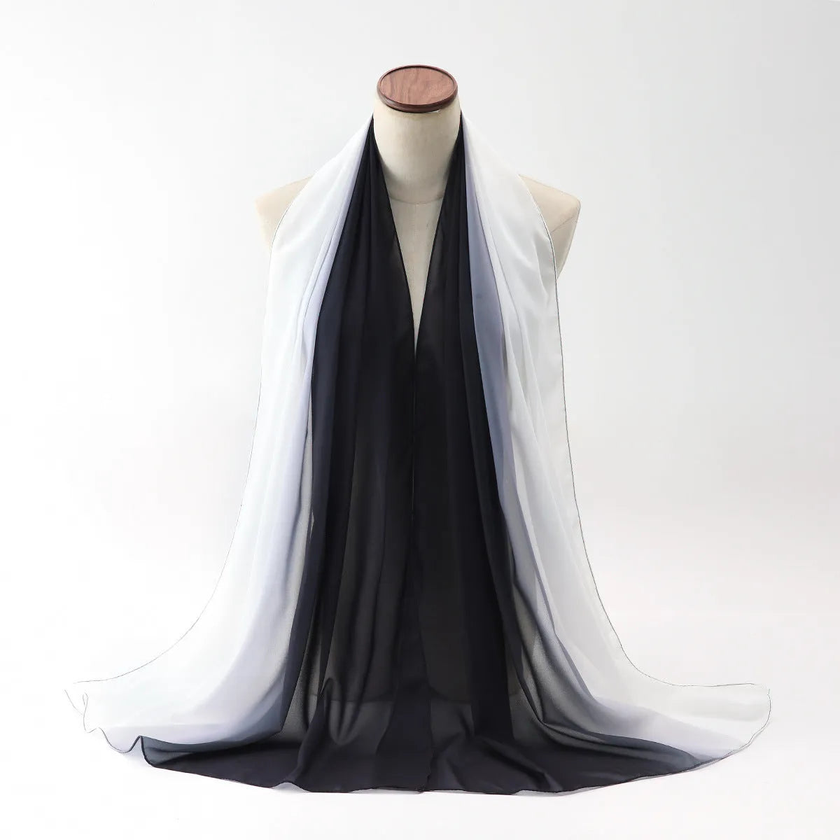 Long polyester chiffon summer scarf for women in an ethnic style, shown in one of twelve available colours.