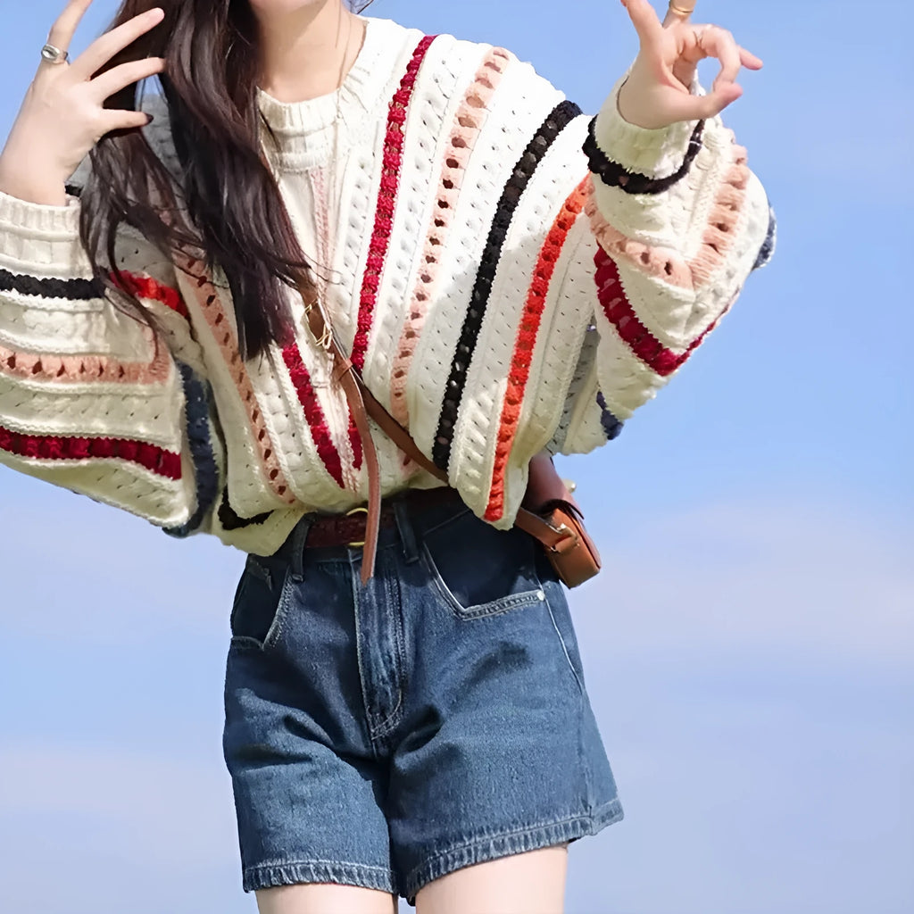 Colourful rainbow striped loose sweater with batwing sleeves and round neck