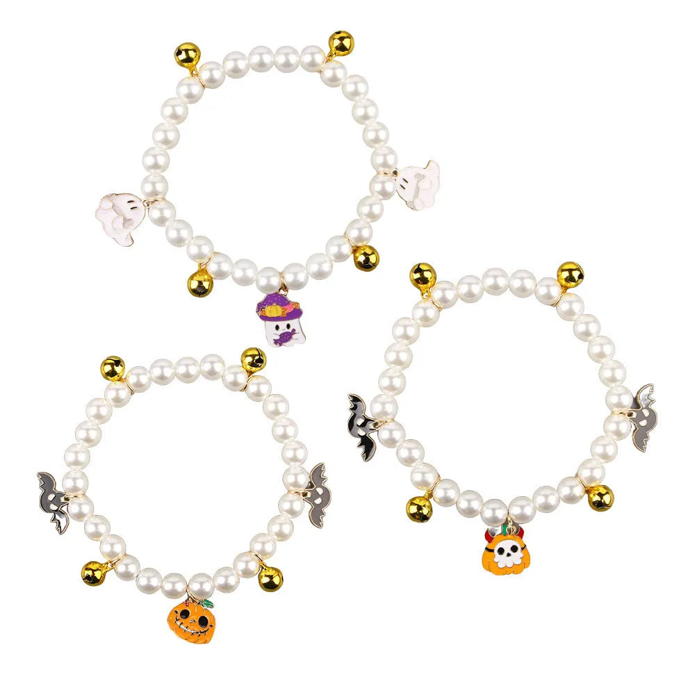 Purple simulated pearl Halloween cat collar decoration with a choice of ghost or pumpkin pendants.