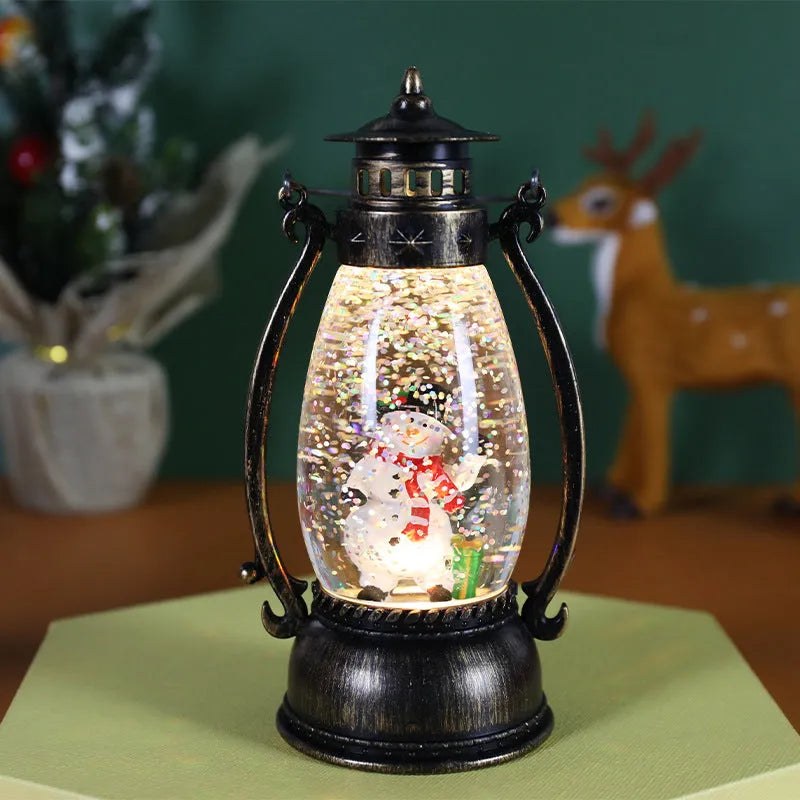 Crystal ball LED Christmas ornament showing snowman and elderly oil lamp design variations