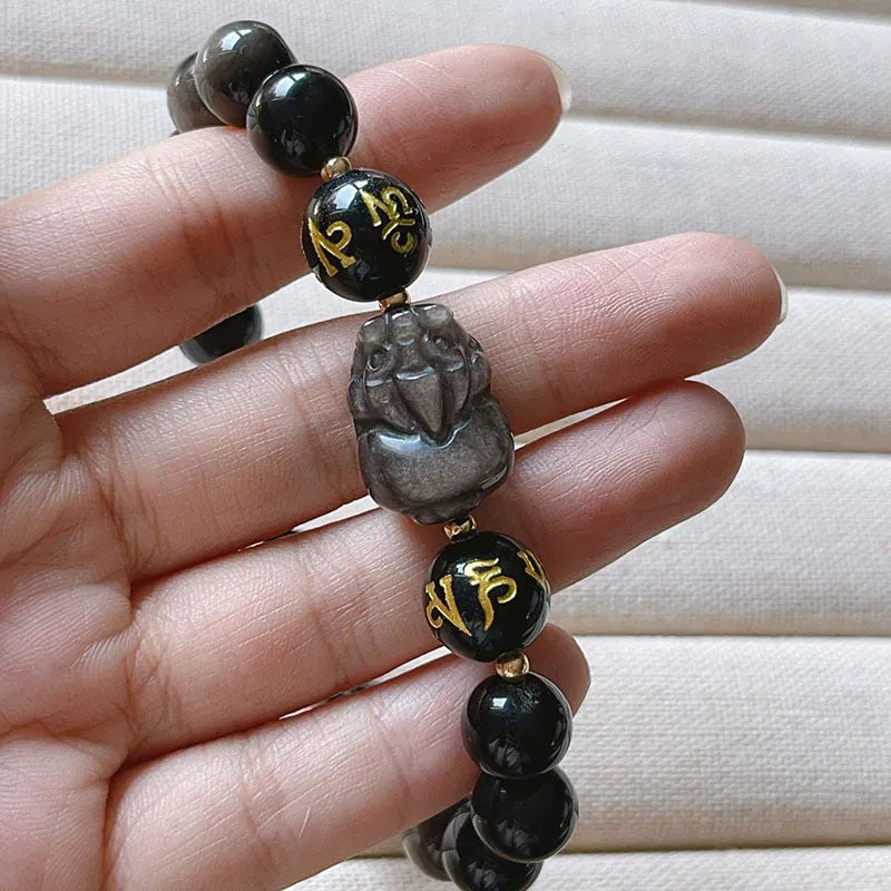 Men's silver stone bracelet with Chinese zodiac designs and proverb beading in handcrafted traditional style