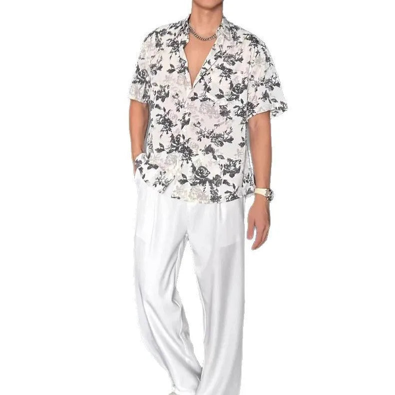 Casual printed shirt with floral pattern and loose fit in black and white colour options