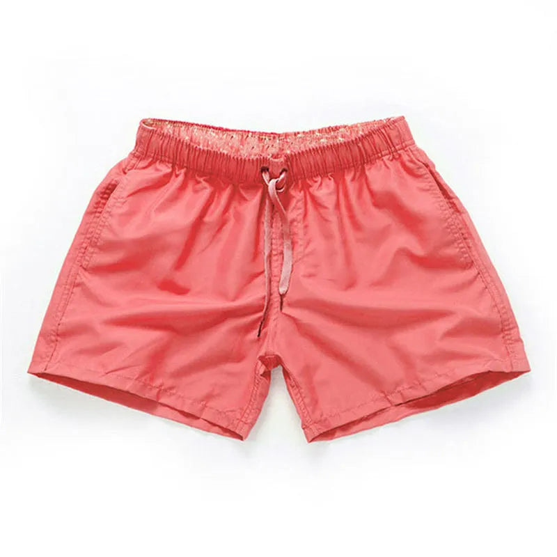 Men's straight leg beach shorts in polyester fabric available in multiple colours and sizes S to 4XL
