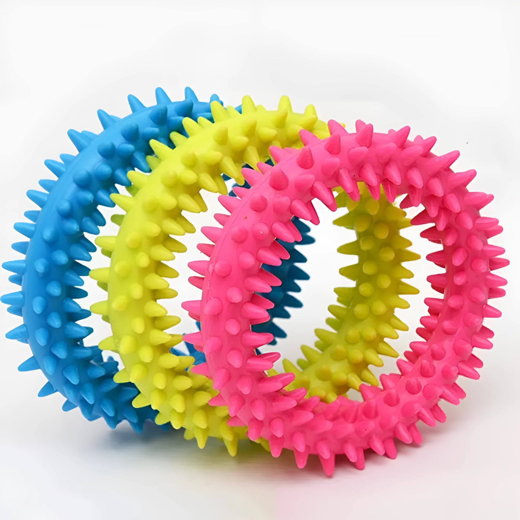 Blue TPR spiky ring dog chew toy with dental cleaning nubs on a white background