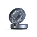 White portable USB rechargeable folding desk fan with remote control on wooden surface
