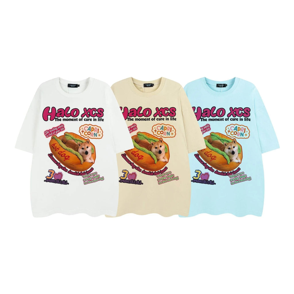 White short-sleeved cotton T-shirt with a cartoon print of a hamburger dog, showing a round neck and loose fit.