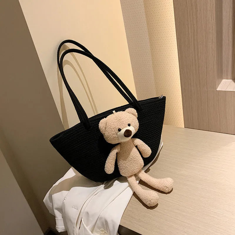 Cotton and linen woven bag with dumpling shape, double shoulder straps, and three-dimensional pocket