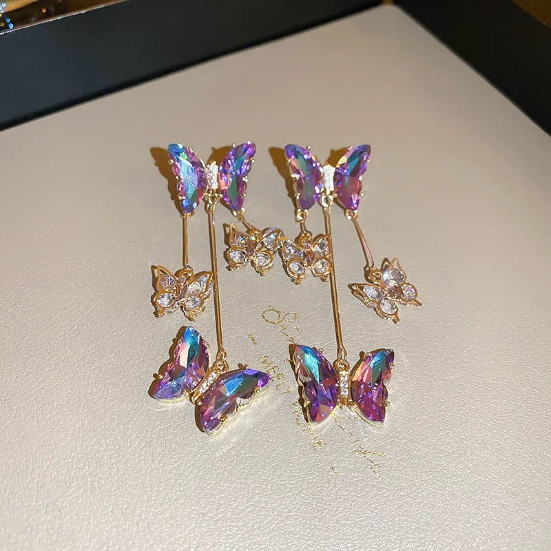 Women's silver needle crystal flowers butterfly tassel earrings with blue purple electroplated alloy design