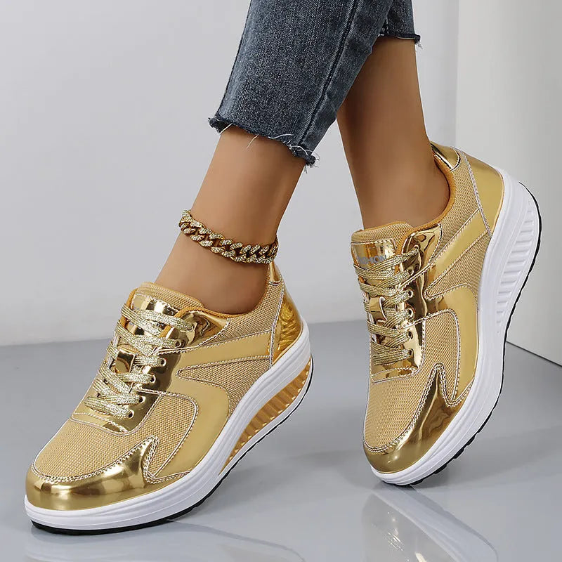 Women's mesh platform shoes with cross strap design in gold colour with waterproof base