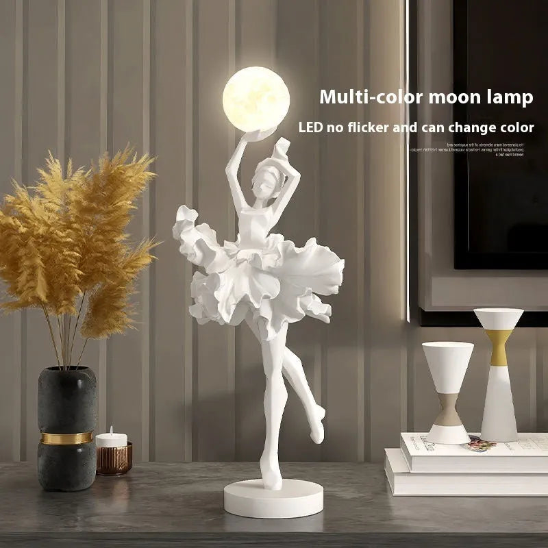 Art Girl Atmosphere small resin night light in Black Gold colour with USB charging cable.
