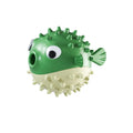Green fish-shaped interactive dog toy with treat dispenser for medium and large dogs