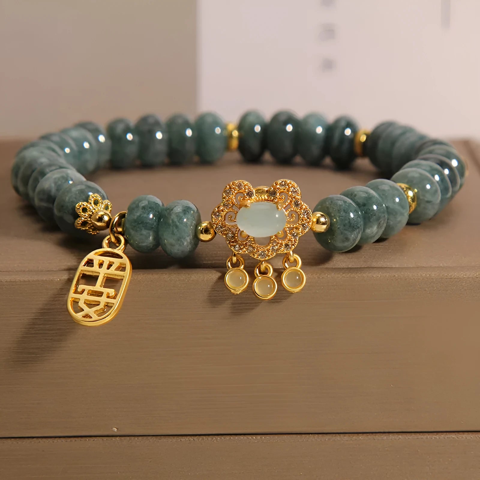 Women's natural emerald green jade bracelet with alloy safety lock clasp and abacus beads design