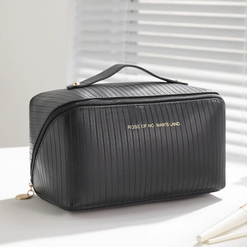 Cubic pillow makeup bag with vertical pattern in five colour options showing 22.5cm dimensions