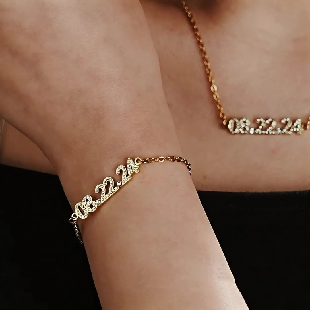 Stainless steel digital bracelet with diamond studs around LED display, shown in gold colour