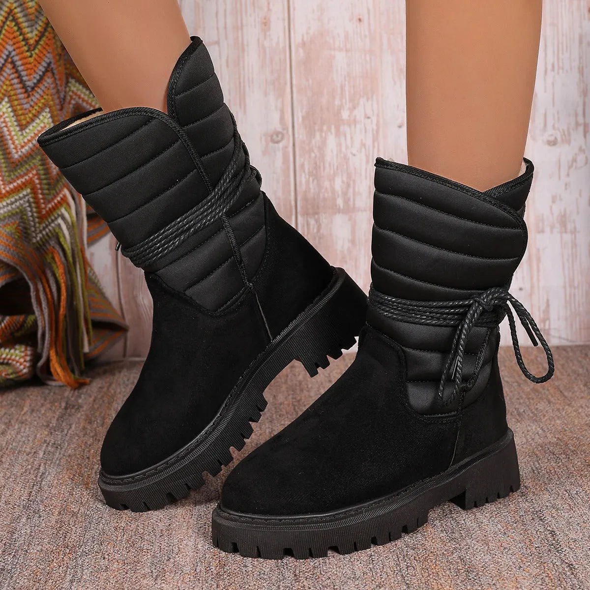 Women's black suede snow boots with chunky heel, lace-up front and fleece lining