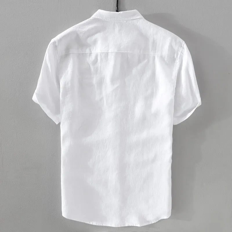 Man wearing a light-coloured pure linen short sleeve casual shirt with a loose fit