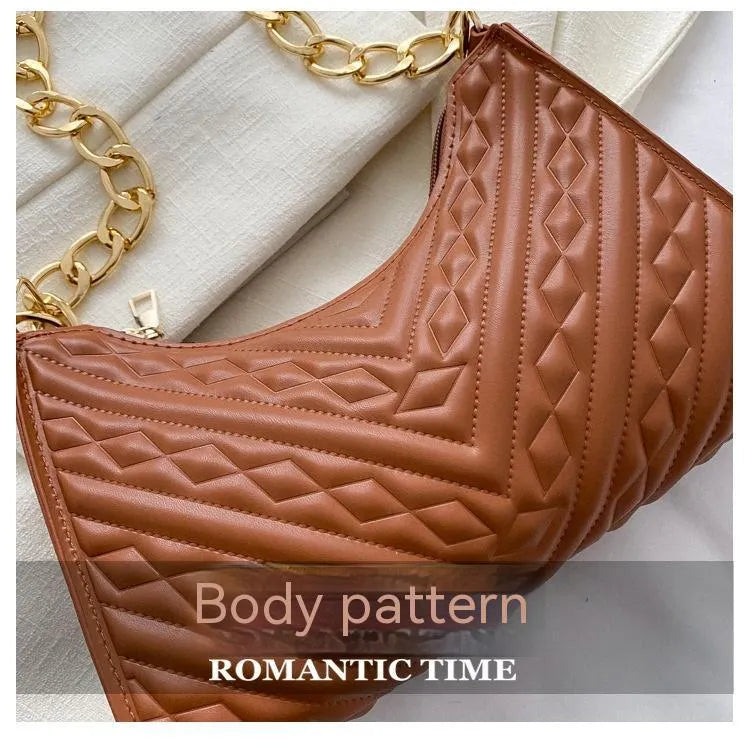 Brown pleated chain baguette shoulder bag showing vertical square shape and adjustable 50cm strap