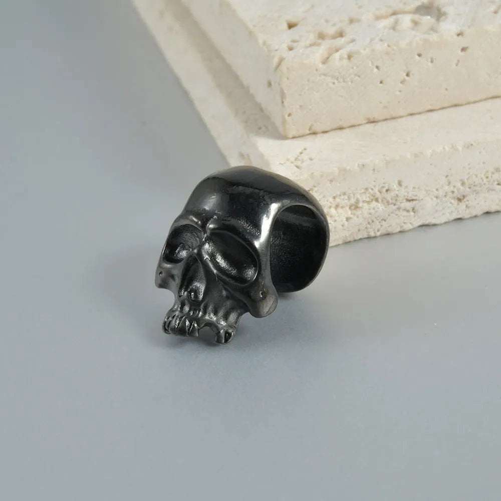 Stainless steel hollow geometric skull Buddha earrings for auricle piercing in electroplated colours
