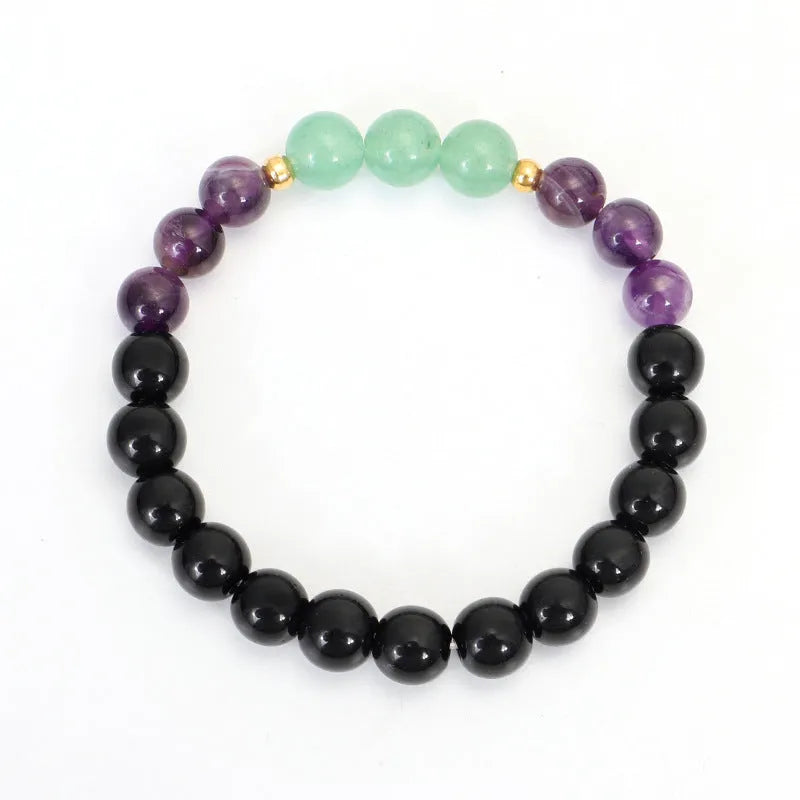 Dongling long yoga lotus pendant necklace and bracelet set with geometric alloy pendant and stone beads.