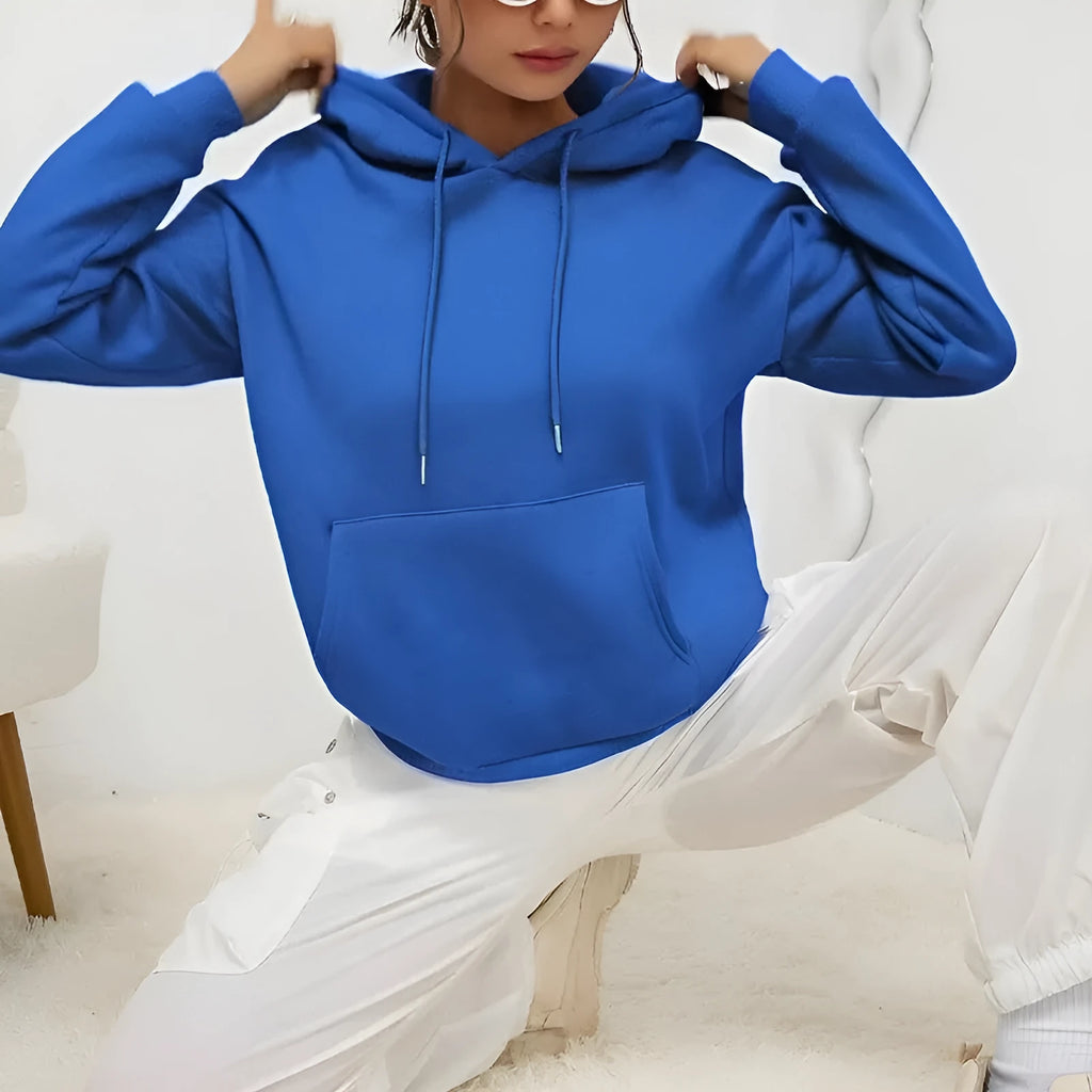 A loose-fitting women's long-sleeve sweatshirt with a drawstring pocket, shown in a solid colour.