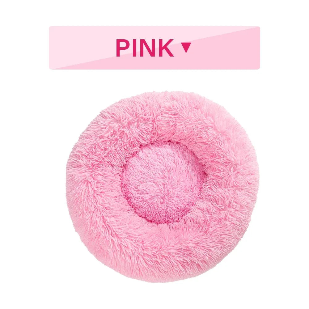 Donut-shaped long plush pet bed with raised sides, shown in a neutral colour.