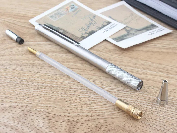 Metal mechanical pencil with automatic feed mechanism and choice of five lead sizes