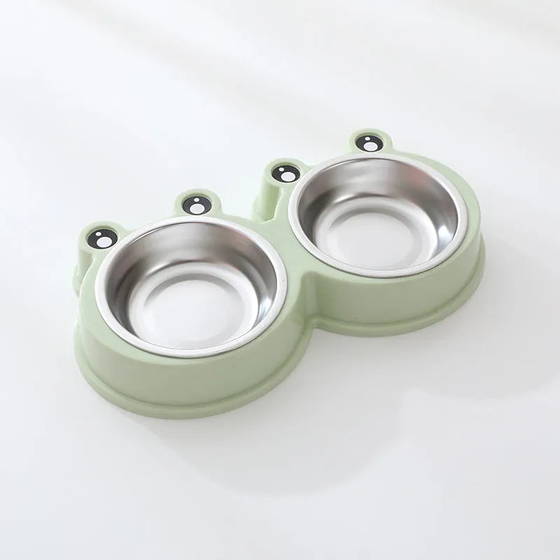 A stainless steel pet bowl with two compartments for water and food, shown in blue.