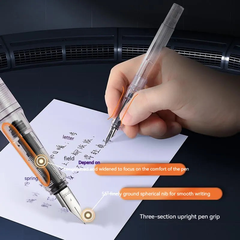 Automatic suction pen set with plastic body, stainless steel tip, ink feeder, and handbag on a desk.