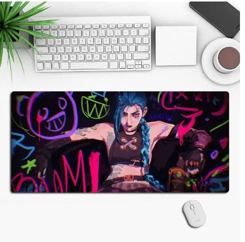 Anime pattern gaming mouse pad with non-slip rubber base on desk surface