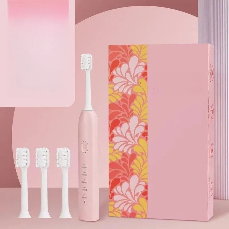 Small yellow duck electric toothbrush with soft bristles and USB charging in green pink and yellow colours