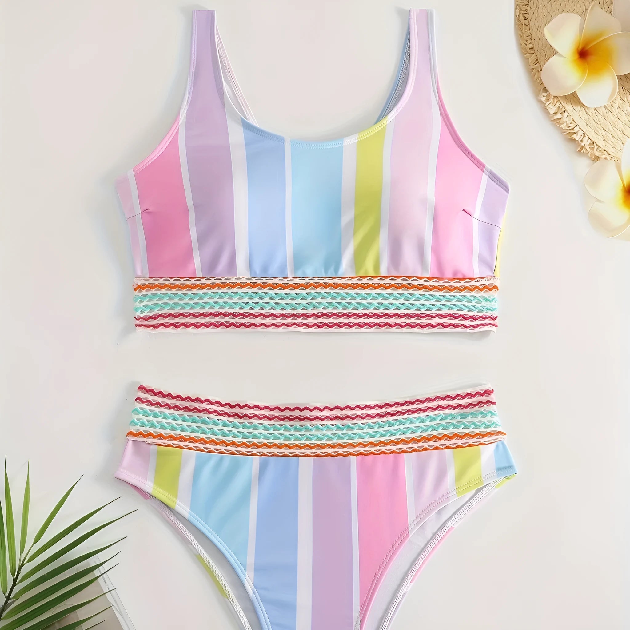 Women's striped two-piece sports bikini swimwear set on a mannequin.