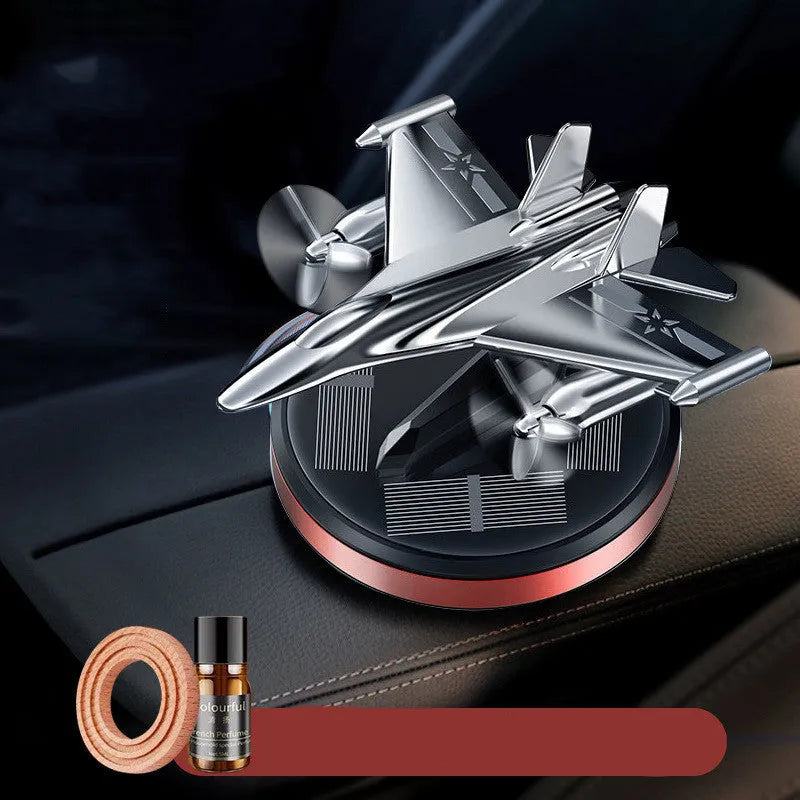 Solar powered rotating fighter jet perfume ornament in aluminium alloy with essential oil bottle