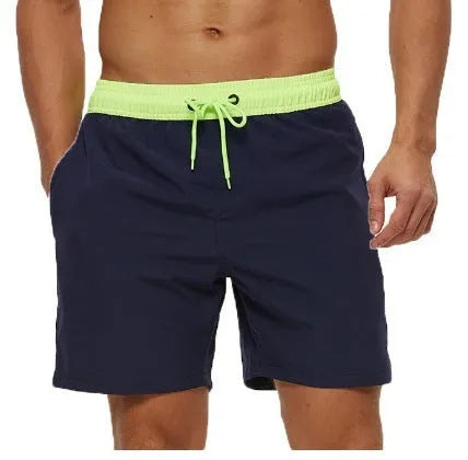 Men's blue fitness shorts with stitching waist detail, drawstring, and multiple pockets for gym workouts