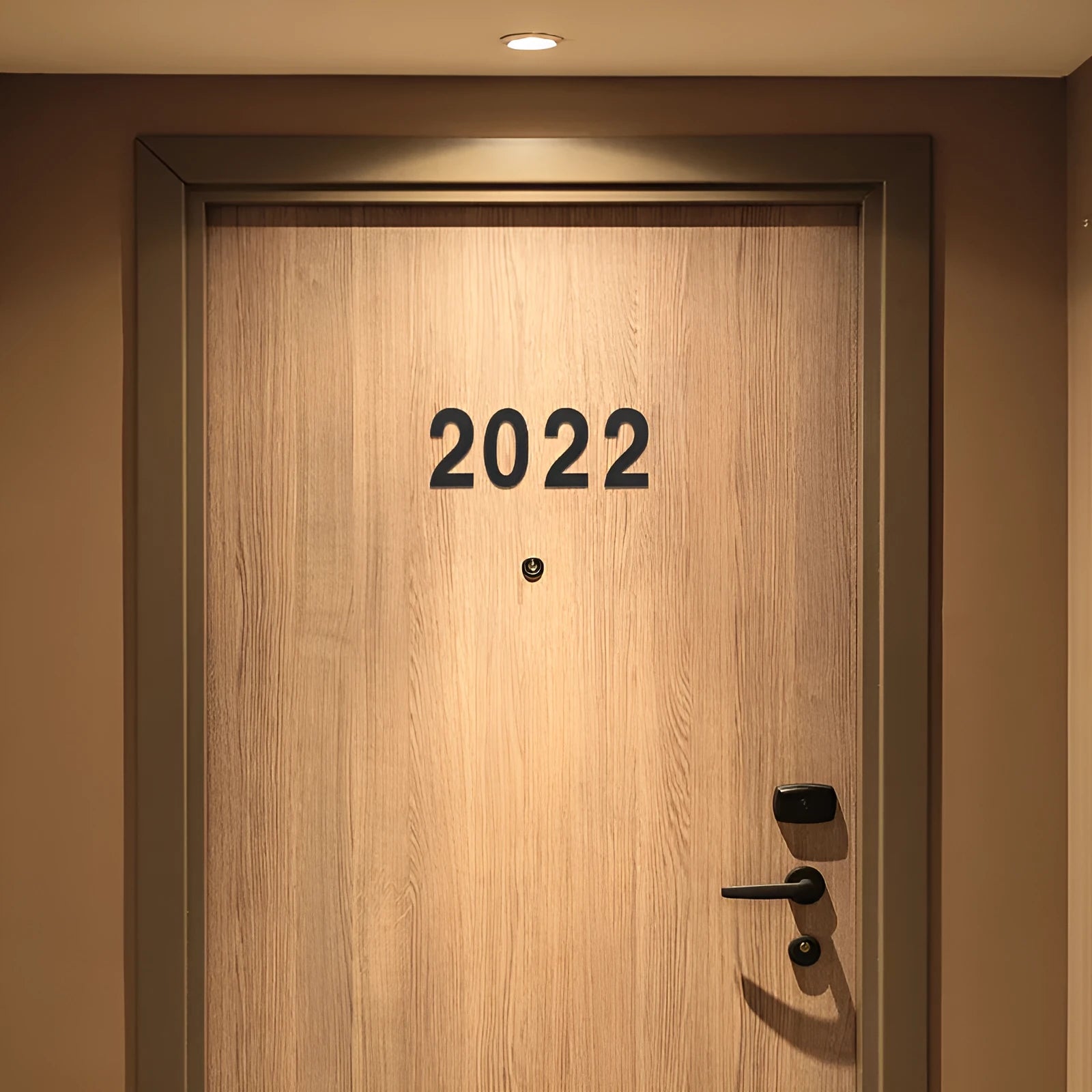 Black stainless steel sticky house number with 7.5cm character on adhesive backing