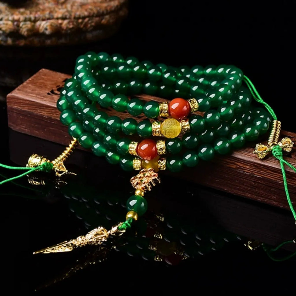 Handmade green agate multi-strand bracelet for men and women on a white background.
