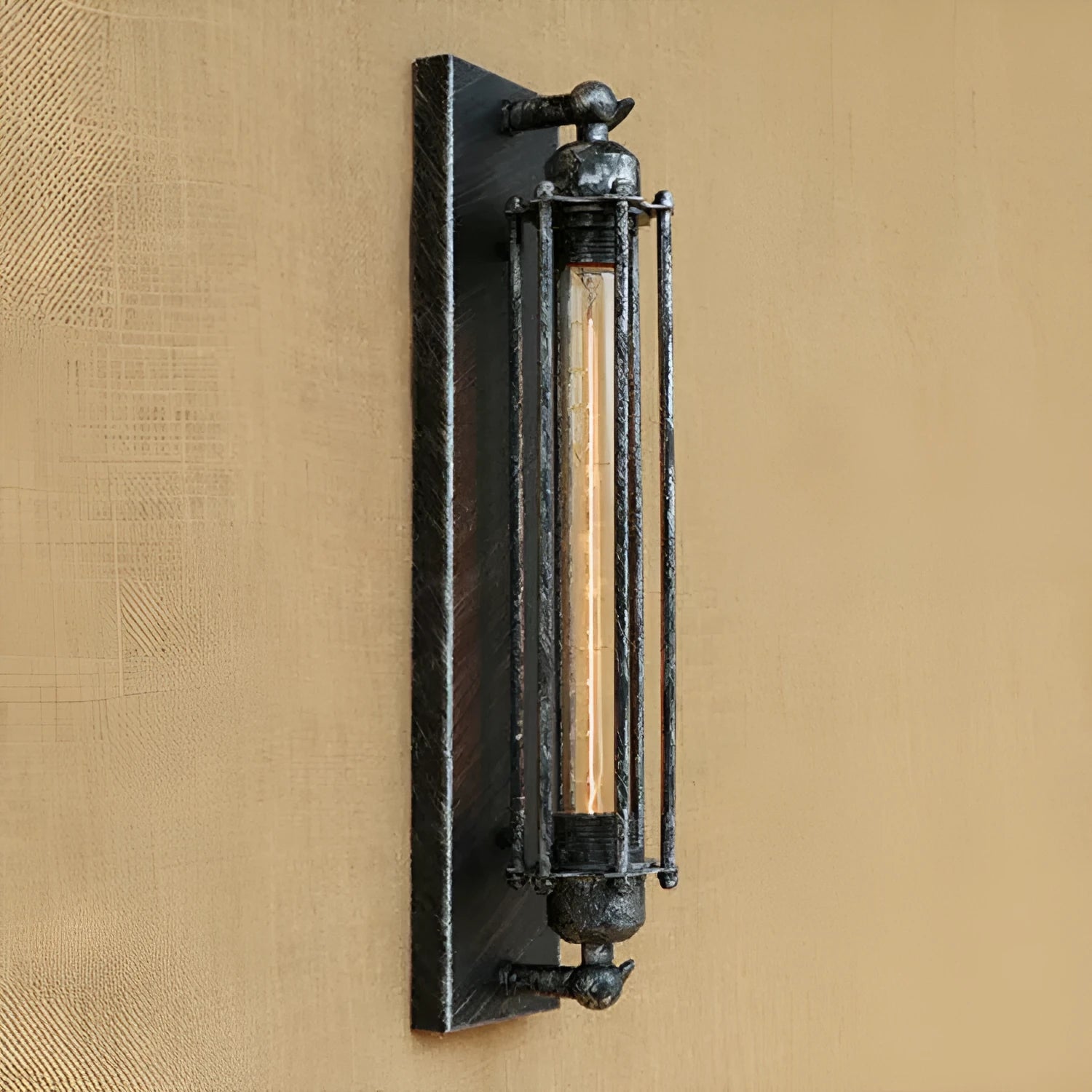 Industrial retro iron wall lamp in antique style with elongated flute-shaped shade.