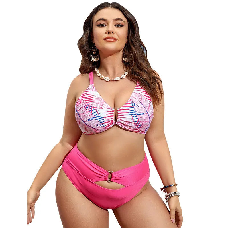 Pink floral plus-size women's bikini swimsuit with adjustable straps on separate top and bottom pieces