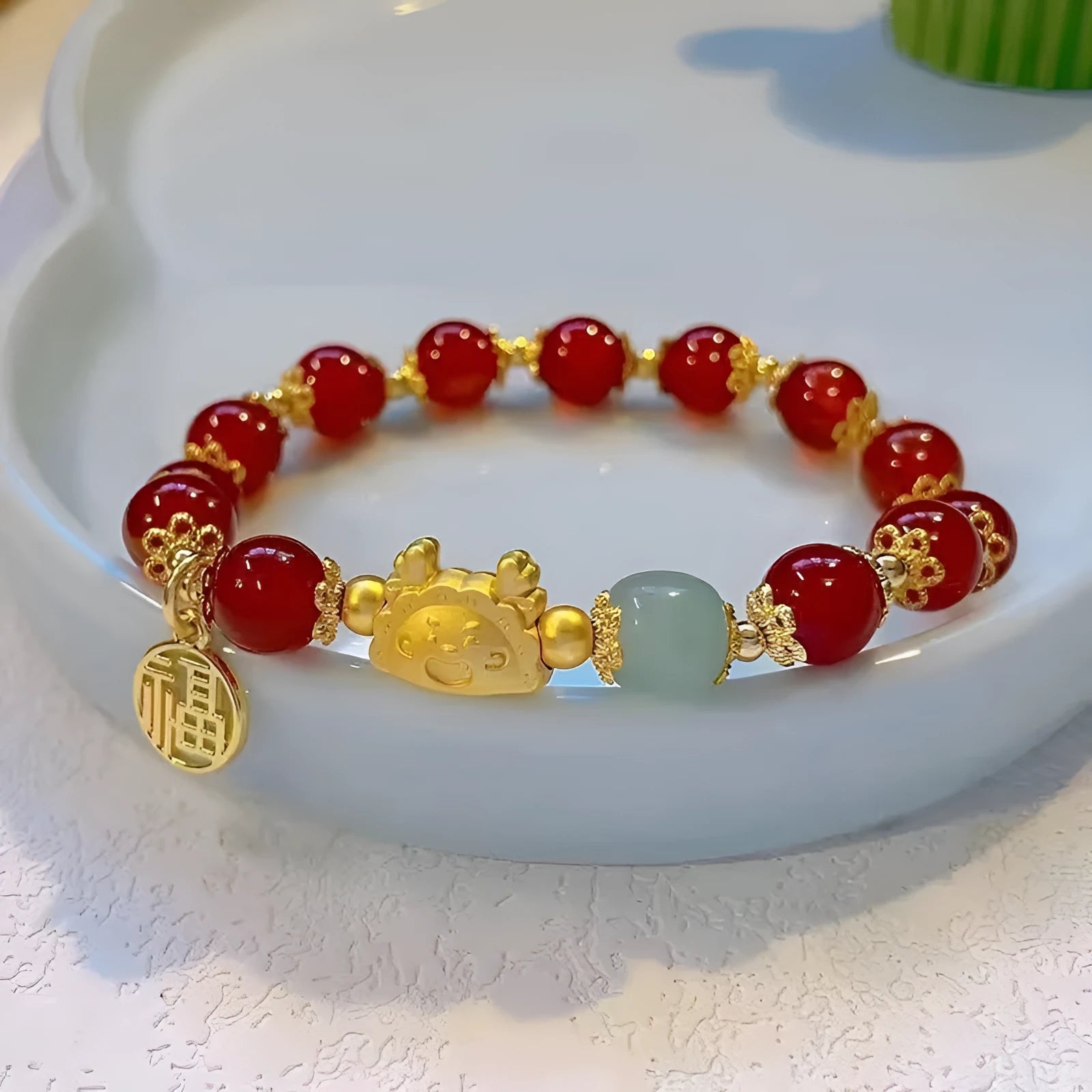 Floral glazed zodiac bracelet with glass beads and coloured glaze animal charm