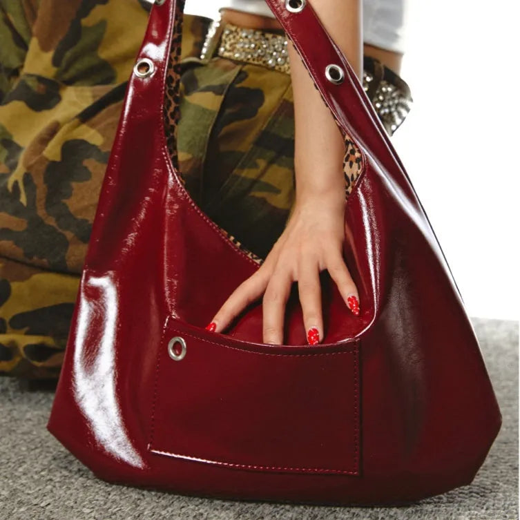 Red leopard print PU leather retro shoulder bag with a dumpling shape and two-side pouches.
