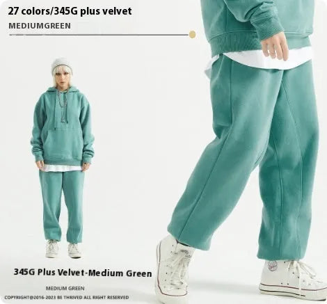 Men's solid colour cotton velvet casual sweatpants with elasticated waist and ankle cuffs.