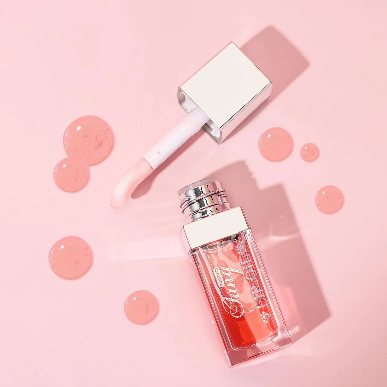 Mint flavour lip gloss stick in twist-up tube showing sheer glossy finish on lips