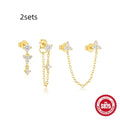 Set of three S925 sterling silver geometric tassel ear studs with zircon details on a plain background.