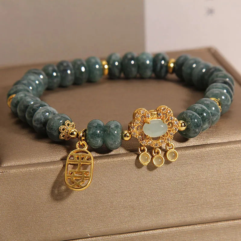 Women's natural emerald green jade bracelet with alloy safety lock clasp and abacus beads design