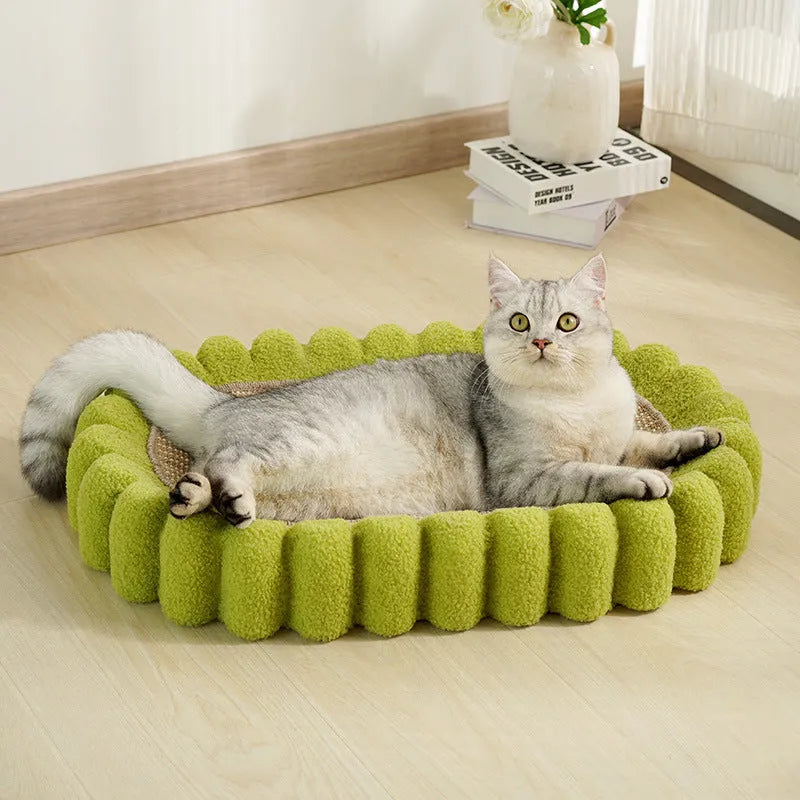 Green oval sisal cat scratching pad bowl serving as a cat bed and furniture protector